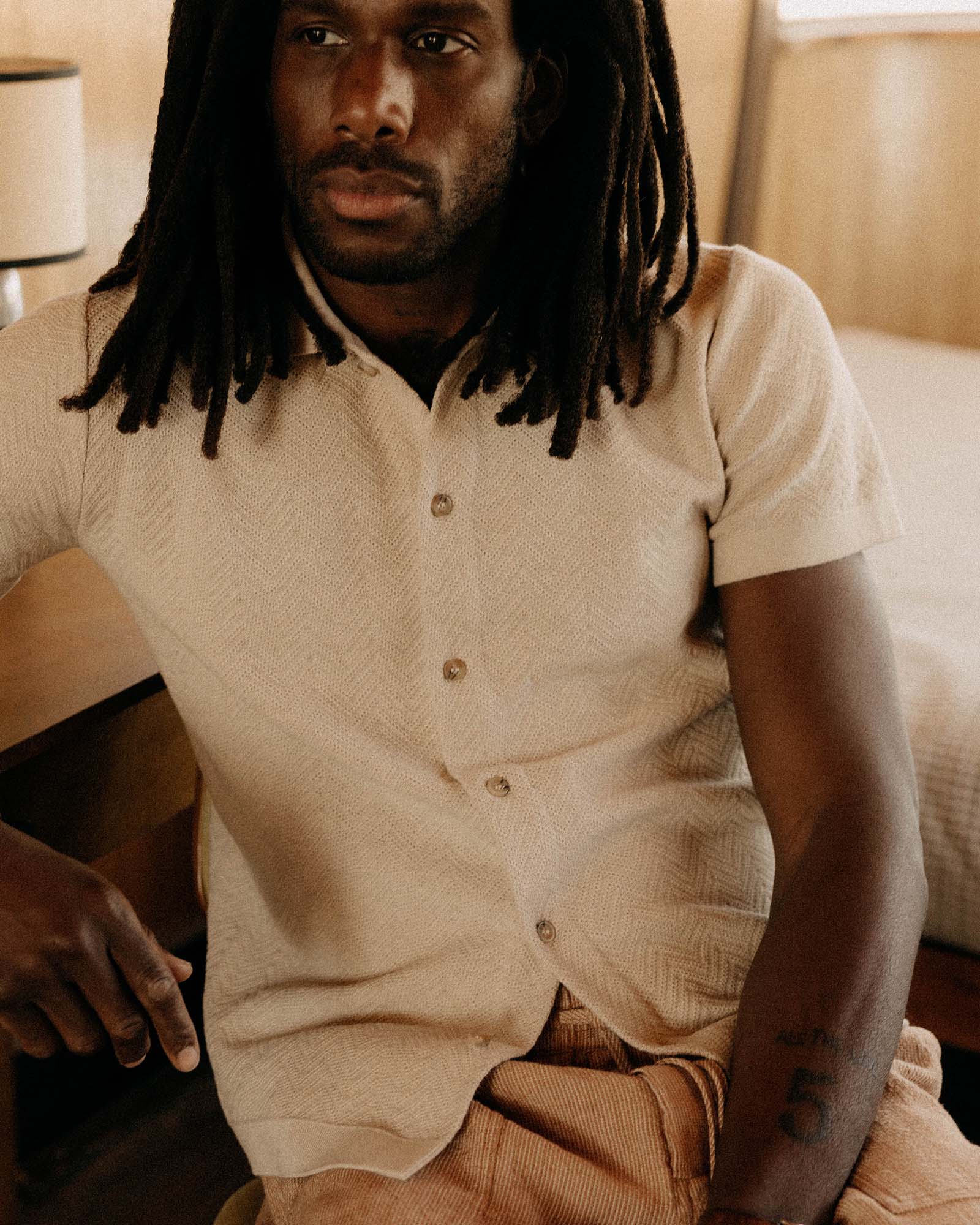The Button Down Polo in Heather Oat Herringbone - Image 3